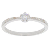 Elegant round white diamond ring in sterling silver with accent stones, perfect for elevating your style and radiating sophistication.